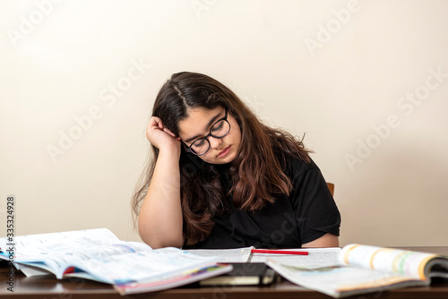 young girl tired of studying