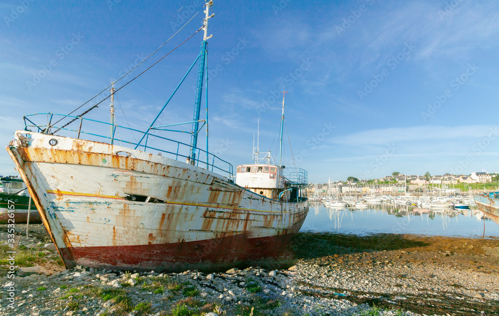 rotten fishing vessels on the beach of the pitouresk breton village of Camaret sur mer rotten fishing vessels on the beach of the pitouresk breton village of Camaret sur mer