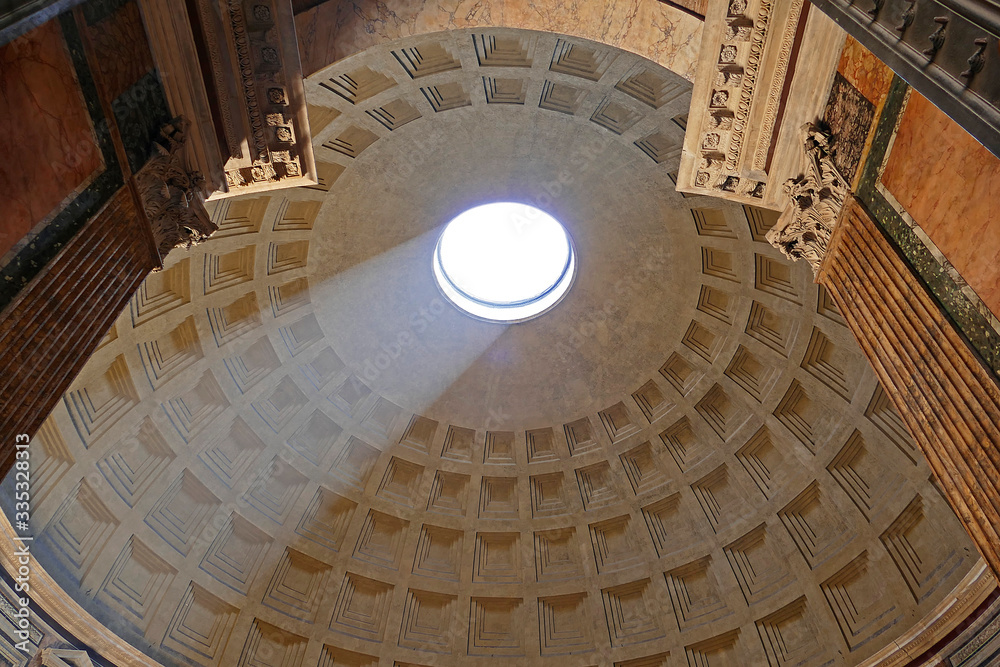 Sun rays entering the ancient Pantheon building in Rome