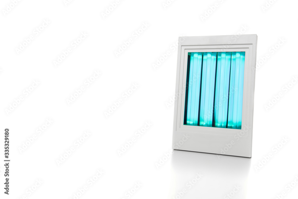 White facial solarium with UV light on a white background White facial solarium with UV light on a white background
