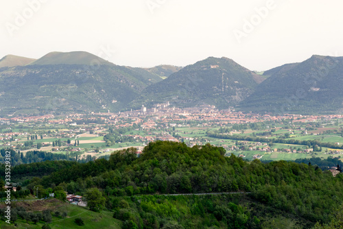 Amazing green landscape in central Italy  in Umbria between Gubbio and Assisi. Here the land is highly cultivated and there are a lot of beautiful old trees and many footpaths to walk in the nature