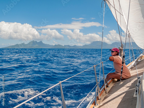 young woman on a sailing ya...