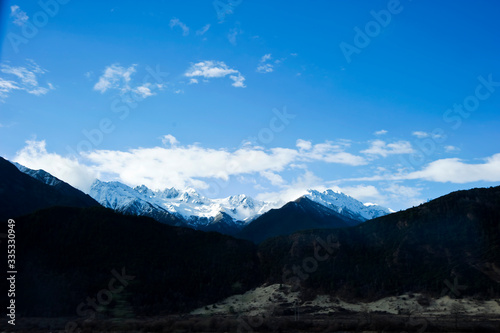 Fototapeta Naklejka Na Ścianę i Meble -  mountain landscape with clouds  in Tibet, China 