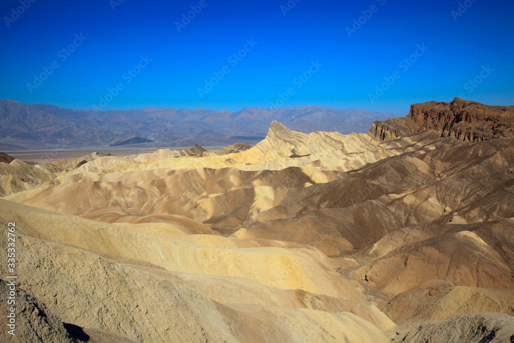 Naklejka premium California / USA - August 22, 2015: The landscape and rock formations around Zabriskie point near Death Valley National Park, California, USA