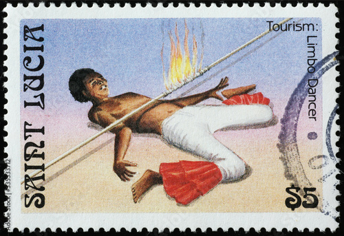 Acrobatic limbo dancer on postage stamp of Saint Lucia