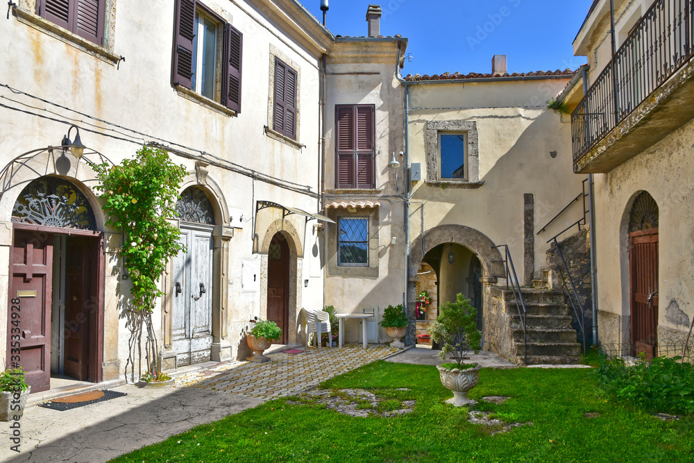 Castel San Vincenzo, Italy, 07/12/2018. A narrow street between the houses of a village in the Molise region