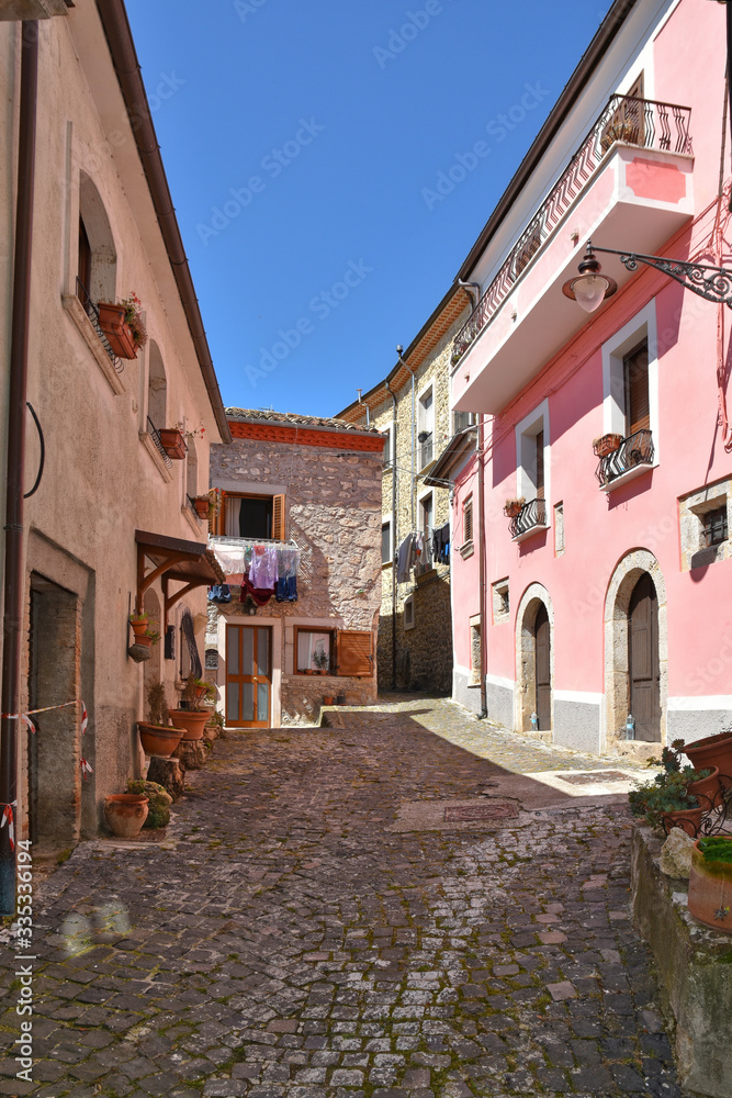 Castel San Vincenzo, Italy, 07/12/2018. A narrow street between the houses of a village in the Molise region