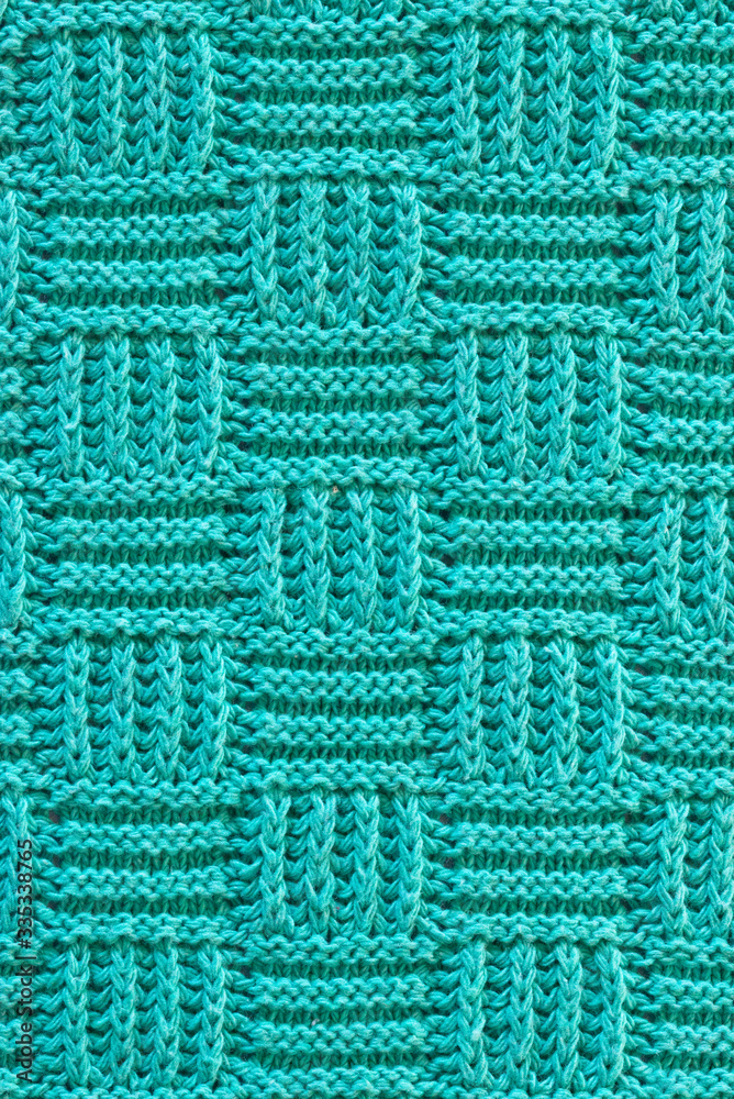 Pattern on a domestic rug made of squares Pattern on a domestic rug made of squares