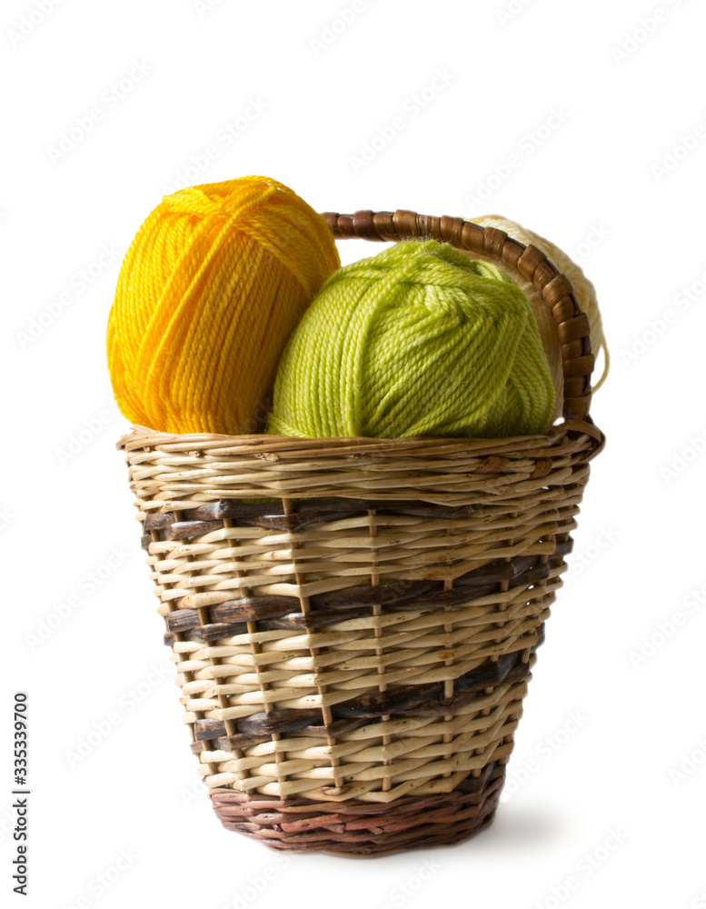 Photo illustration on knitting and needlework. The image is isolated on a white background. Yarn, knitting needles.