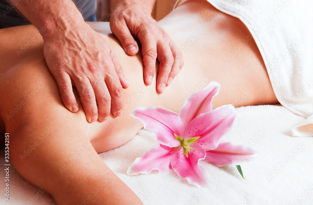 Massage body women in spa. Man hands treatment.