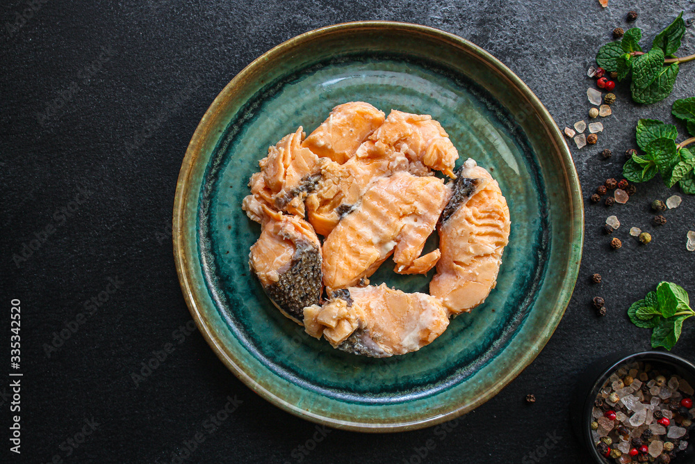 canned salmon, fish preserves seafood in tin can menu concept background. top view. copy space for text canned salmon, fish preserves seafood in tin can menu concept background. top view. copy space for text