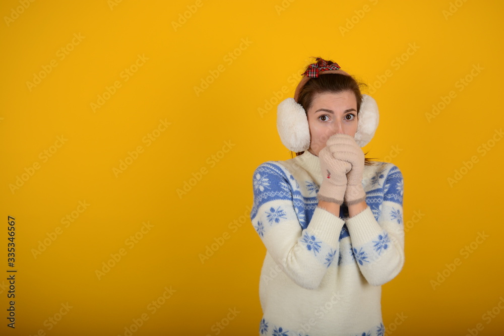 woman in winter sweater on an isolated background woman in winter sweater on an isolated background