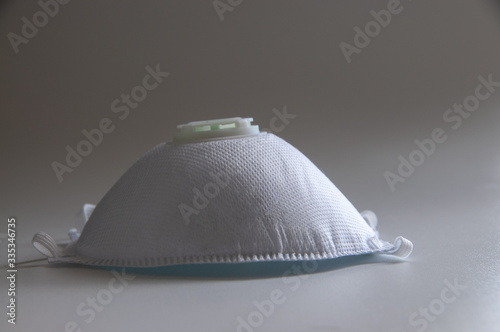 side view of a filter mask on a white background with copy space 