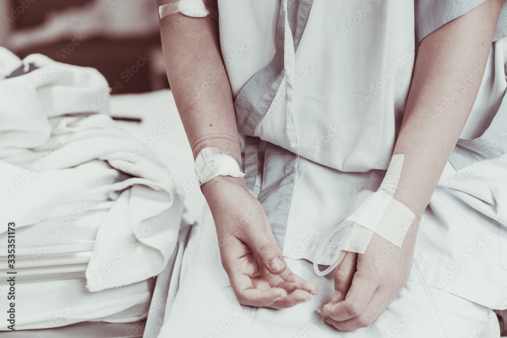 Coma patient on hopital bed take care by doctor nurse due to serious infection diagnosed cancer