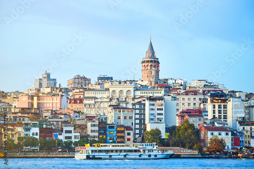 Istanbul cityscape in Turkey with Galata Kulesi Tower. Ancient Turkish famous landmark in Beyoglu district, European side of city. Architecture of the Constantinople.Historical place made by Genoese © bondvit