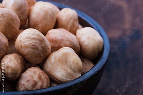 close-up hazelnuts in bowl