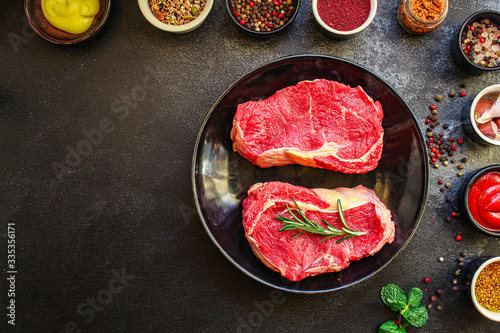 raw steak meat (beef or veal cooking) menu concept keto or paleo diet background. top view. copy spaces for text