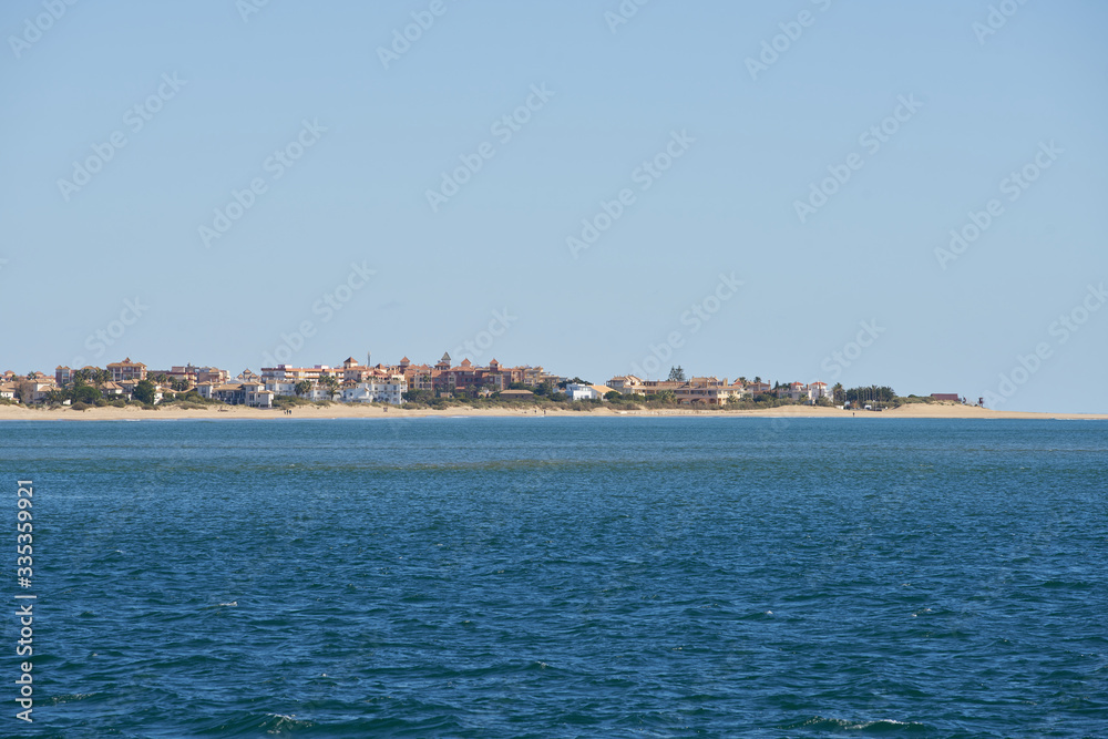 Isla Canela and Ayamonte in Spain view from Vila Real de Santo Antonio in Portugal with Guadiana river