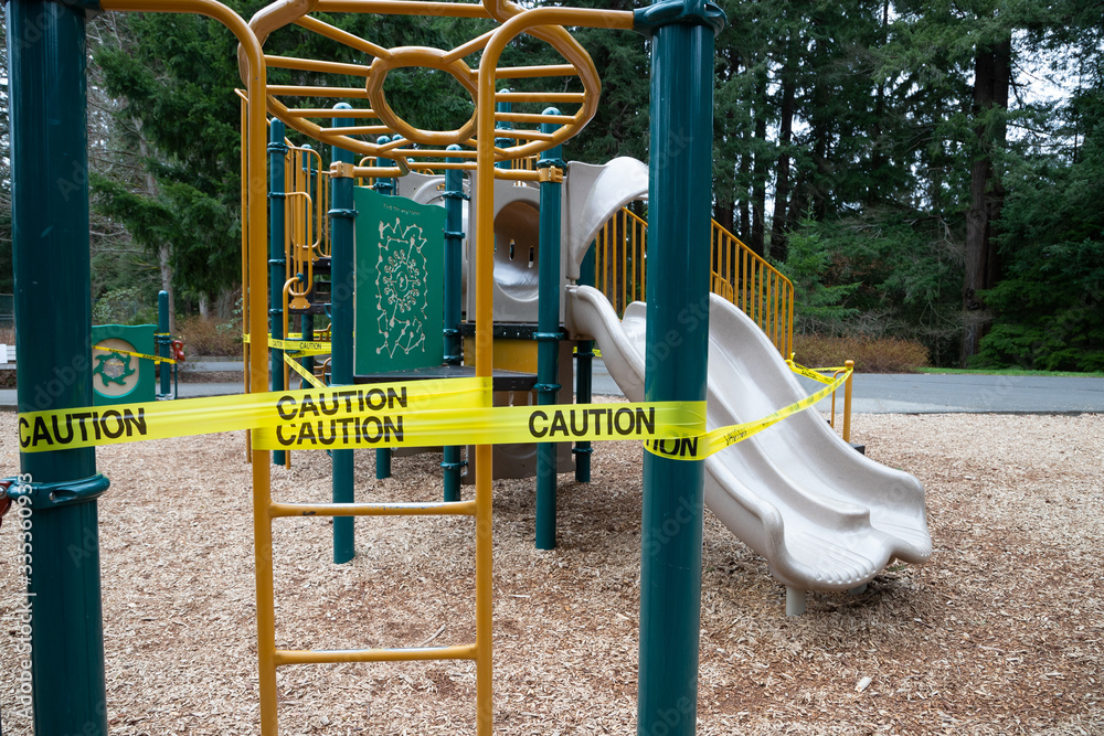 Playground closed with caution tape due to virus in Washington State.