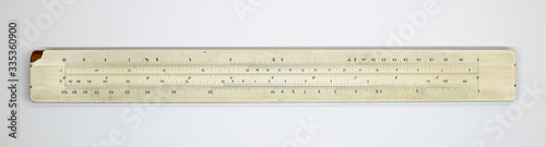 Old pocket slide rule mechanical calculator