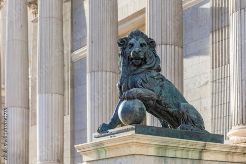 Lion sculpture by the Congress of Deputies - Congreso de Los Diputados Spanish Parliament, Palacio de las Cortes, Madrid