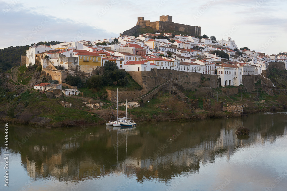 Mertola city view at sunset with Guadiana river in Alentejo, Portugal