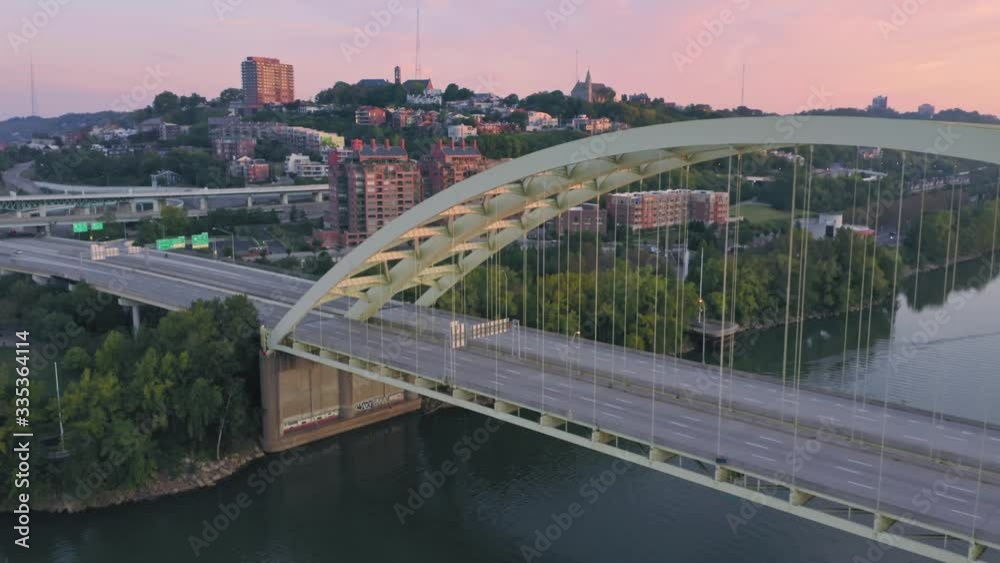 Aerial: Freeway traffic crossing the Daniel Carter Beard Bridge over the Ohio River. Cincinnati, Ohio Aerial: Freeway traffic crossing the Daniel Carter Beard Bridge over the Ohio River. Cincinnati, Ohio