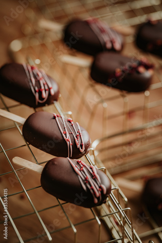 Sweet table at a wedding, monoportions and other sweets, cakesicles photo