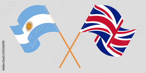 Crossed and waving flags of Argentina and the UK