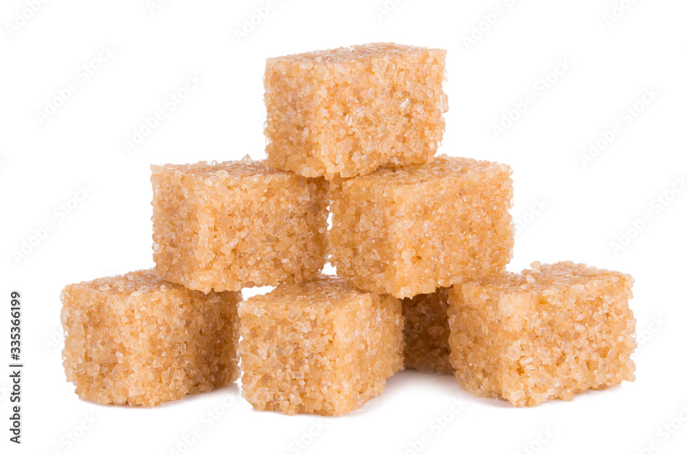 brown sugar cubes isolated on white background with clipping path. brown sugar cubes isolated on white background with clipping path.