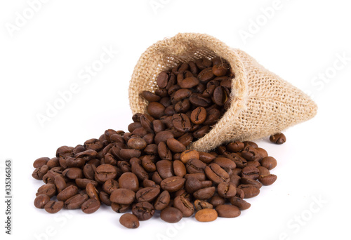 black coffee beans in bag isolated on white background