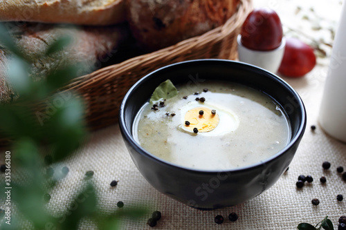 White borscht with egg. Traditional Easter dish. Traditional Easter dishes, serving suggestions, culinary photography.