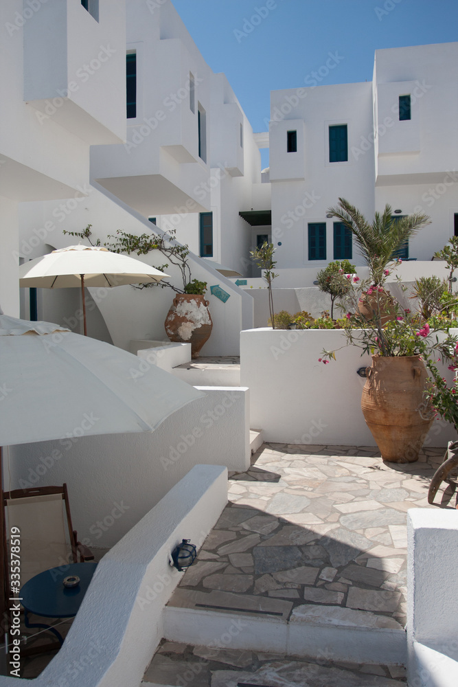 Naklejka premium Santorini island, Greece, Aegan Sea. Traditional and famous white houses and churches with sea view