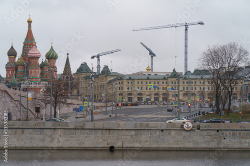 No people, only cars at streets. Photography of the Saint Basil's Cathedral. Bolshoy Moskvoretsky Bridge. Concepts - Stay at home, save live. Social distancing    photo