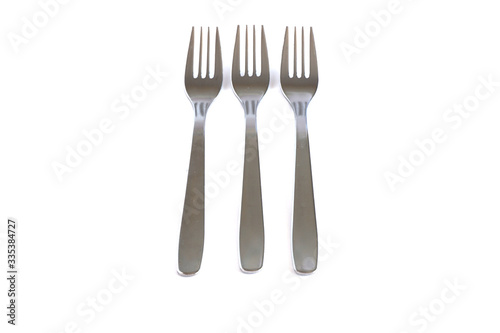 Dessert forks on a white background