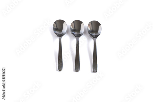 Dessert spoons on a white background