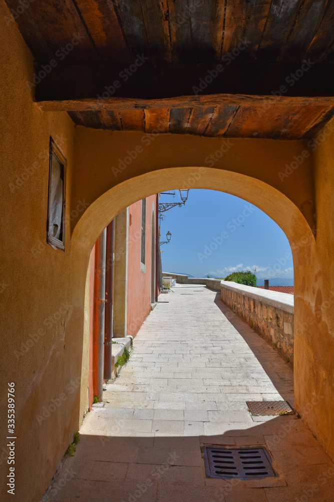 Scapoli, Italy, 06/02/2018. A narrow street between the houses of a village in the Molise region