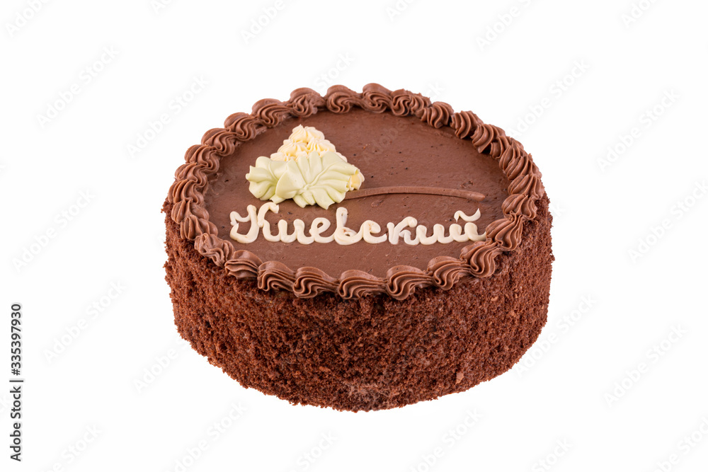 Kiev cake with chocolate cream on white background Kiev cake with chocolate cream on white background