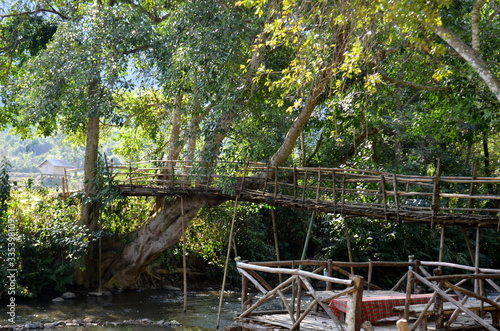 Beautiful view of a bamboo bridge in the countryside of Laos