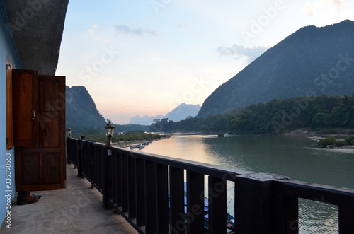 Muang Ngoy, Laos, January 15th 2016: stunning view from the guesthous of the River and the Mountains photo