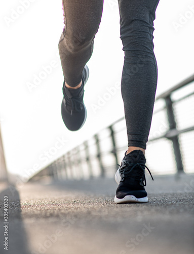 Close up of legs during run on the bridge