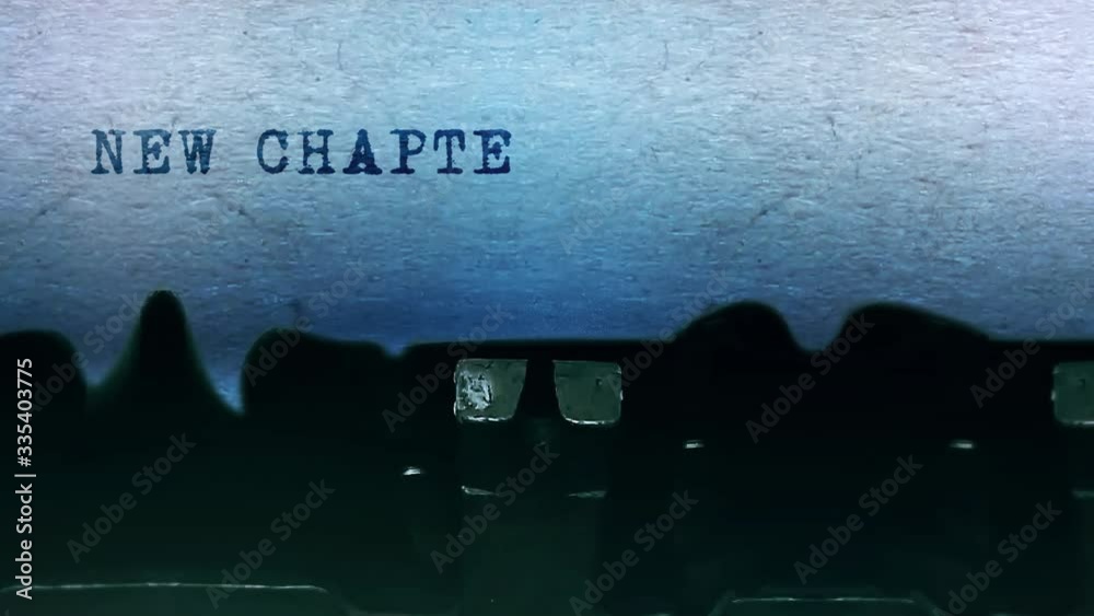 New Chapter Word closeup Being Typing and Centered on a Sheet of paper on old vintage Typewriter mechanical 4k Footage Background Animation.