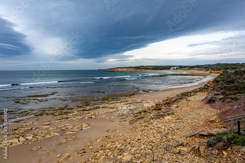 Weather front and cloudy skies over Torquay Beach  Great Ocean Road  Australia