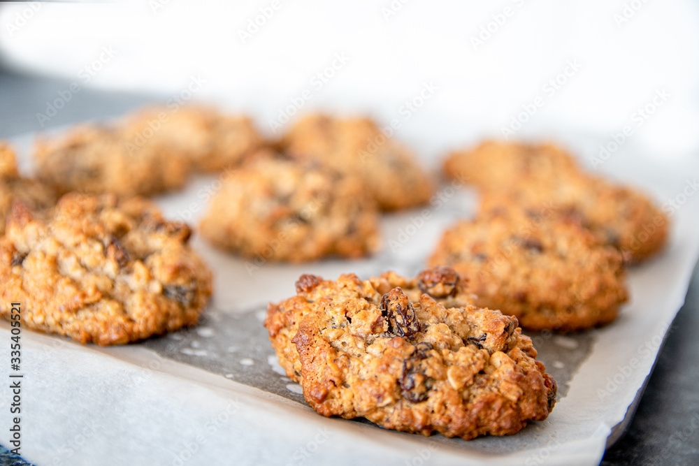 A fresh batch of oven baked oat biscuits with raisins