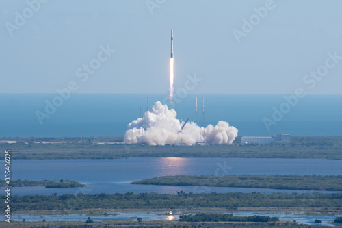 Slika na platnu Rocket launch liftoff reflection on water