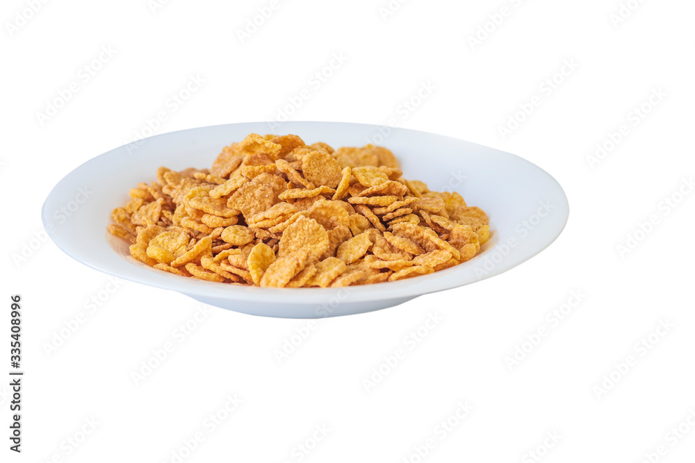 Flakes. Plate on a white background. Close-up. Is isolated Flakes. Plate on a white background. Close-up. Is isolated