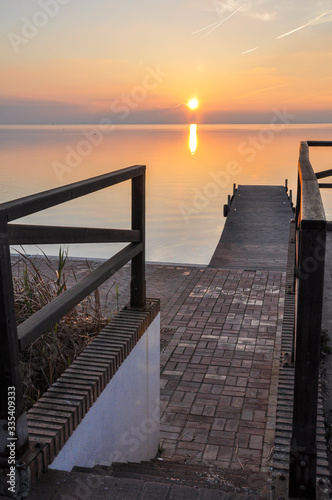Sunset at pier in the Natural Park of the Albufera in Valencia © cesc92