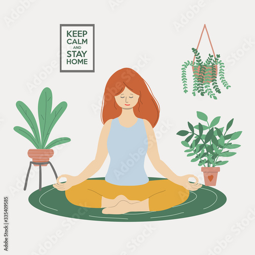 Woman sitting in the Lotus position and meditating at home. Concept of quarantine, poster with phrase Keep calm and stay home.