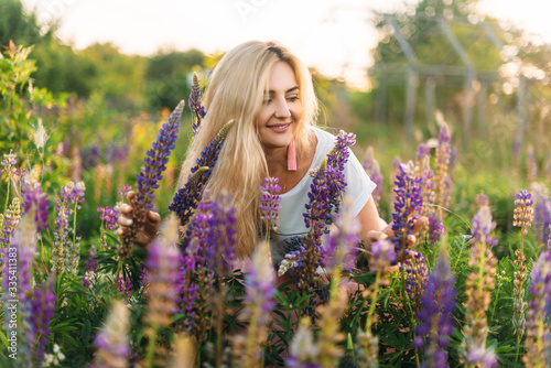 young woman at the lupines field