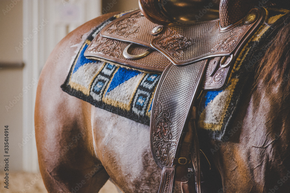 Close up on western horse saddle  - obrazy, fototapety, plakaty 